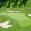 A view of green protected by bunkers at Forest Greens Golf Club